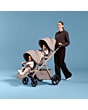 1161099110_F4_2026_maxicosi_stroller_oxfordflexseat_oaktruffle_momstrollerwithtwintoddlersseatmodeworldfacing