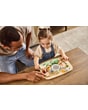 3333151131_2026_TinyLove_WoodenBusyBoard_FarmersFunday_Lifestyleimage_smallgirlwithdad